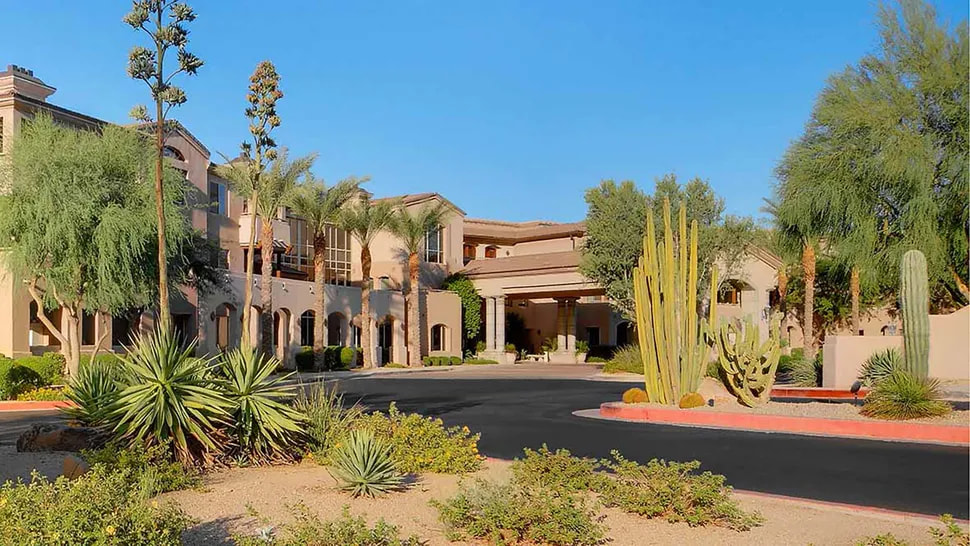 Exterior view of Atria Sierra Pointe senior community in Scottsdale, where Dr. Cook provides personalized geriatric care.