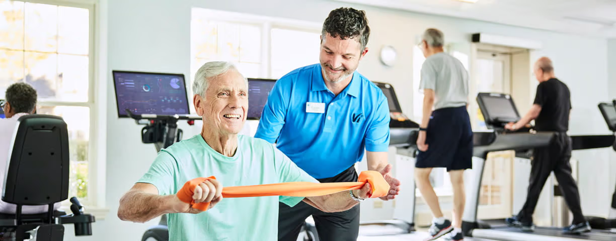 Older adult working with a wellness coach at Vi at Silverstone fitness center in Scottsdale, AZ