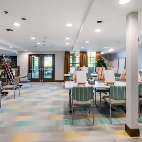 Creative art studio with easels and seating for residents at Andara Senior Living in Scottsdale