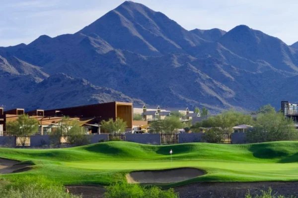 Scenic view of McDowell Mountain Golf Club with lush green fairway and mountain backdrop in Scottsdale, Arizona.