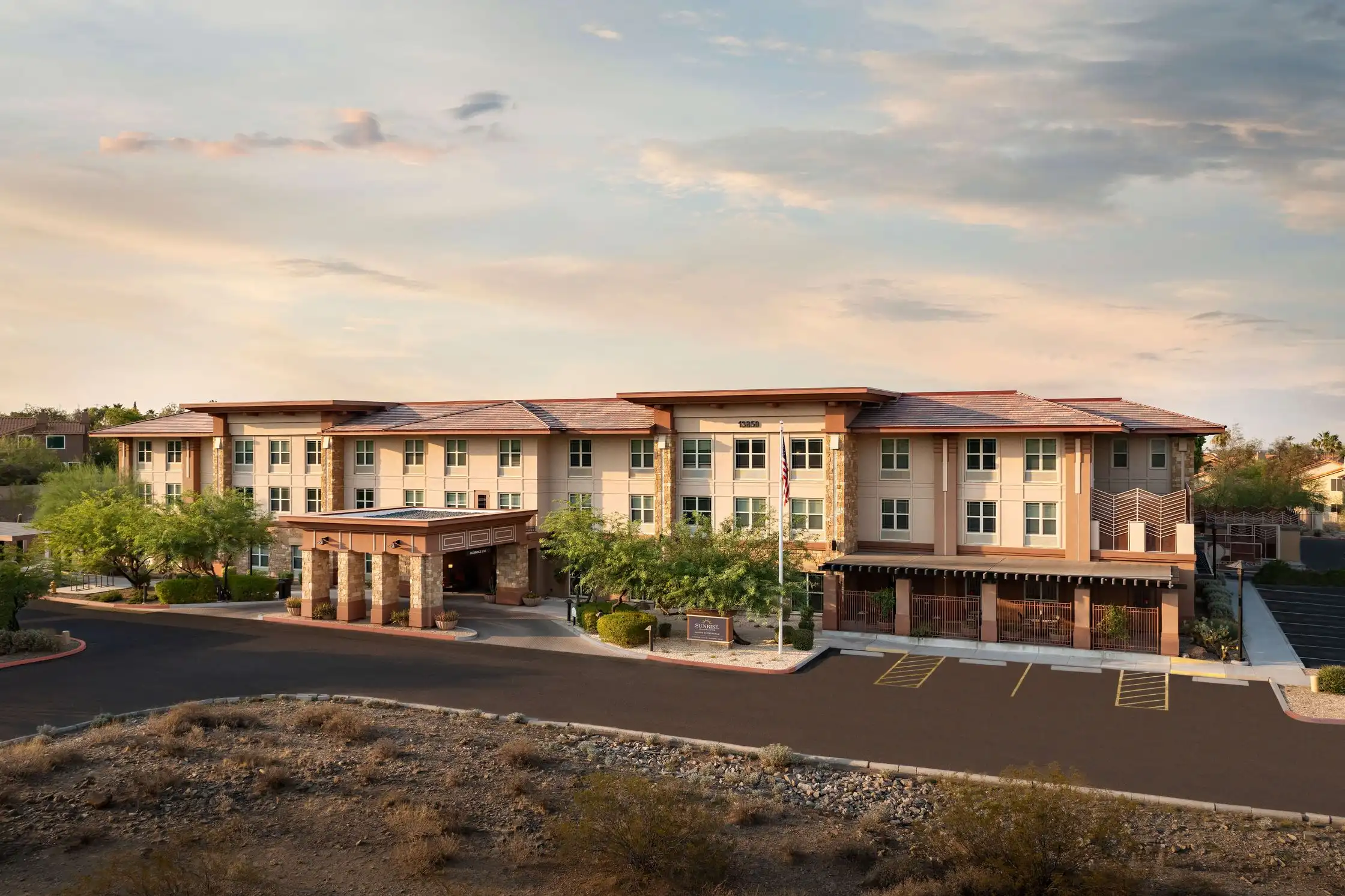 Exterior view of Sunrise of North Scottsdale assisted living community in Scottsdale, AZ at sunset.